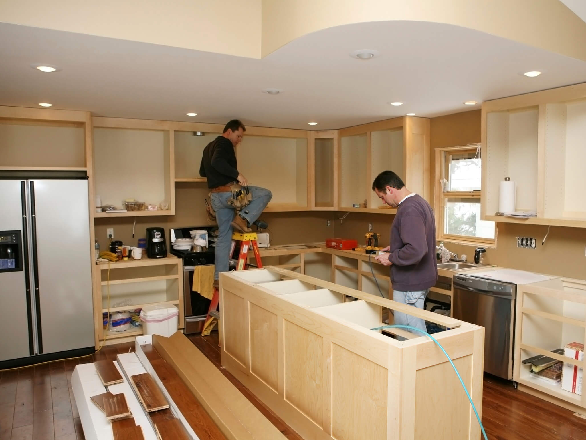 Virginia home with contractors renovating kitchen